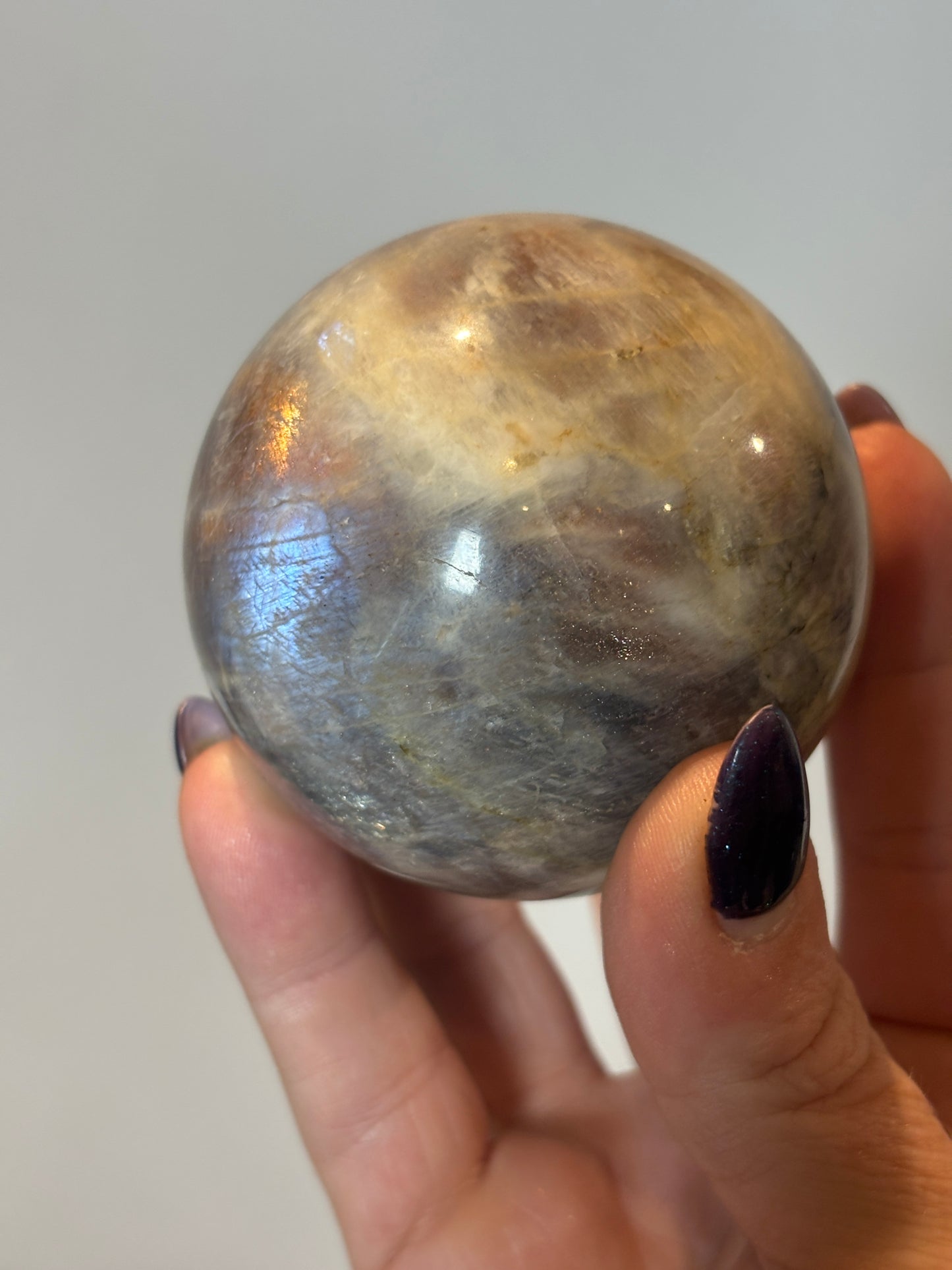 Sunstone in moonstone sphere