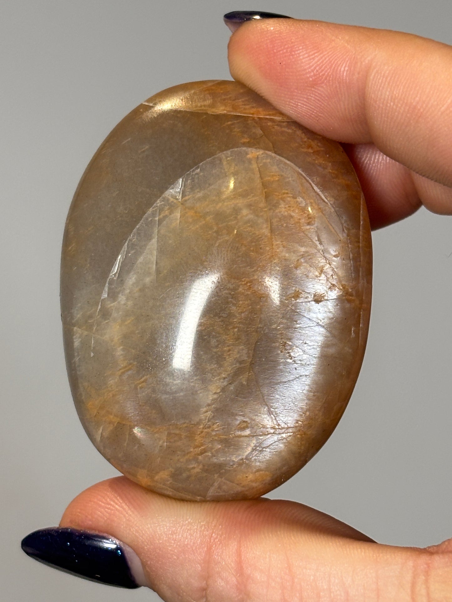 Peach moonstone palm stone