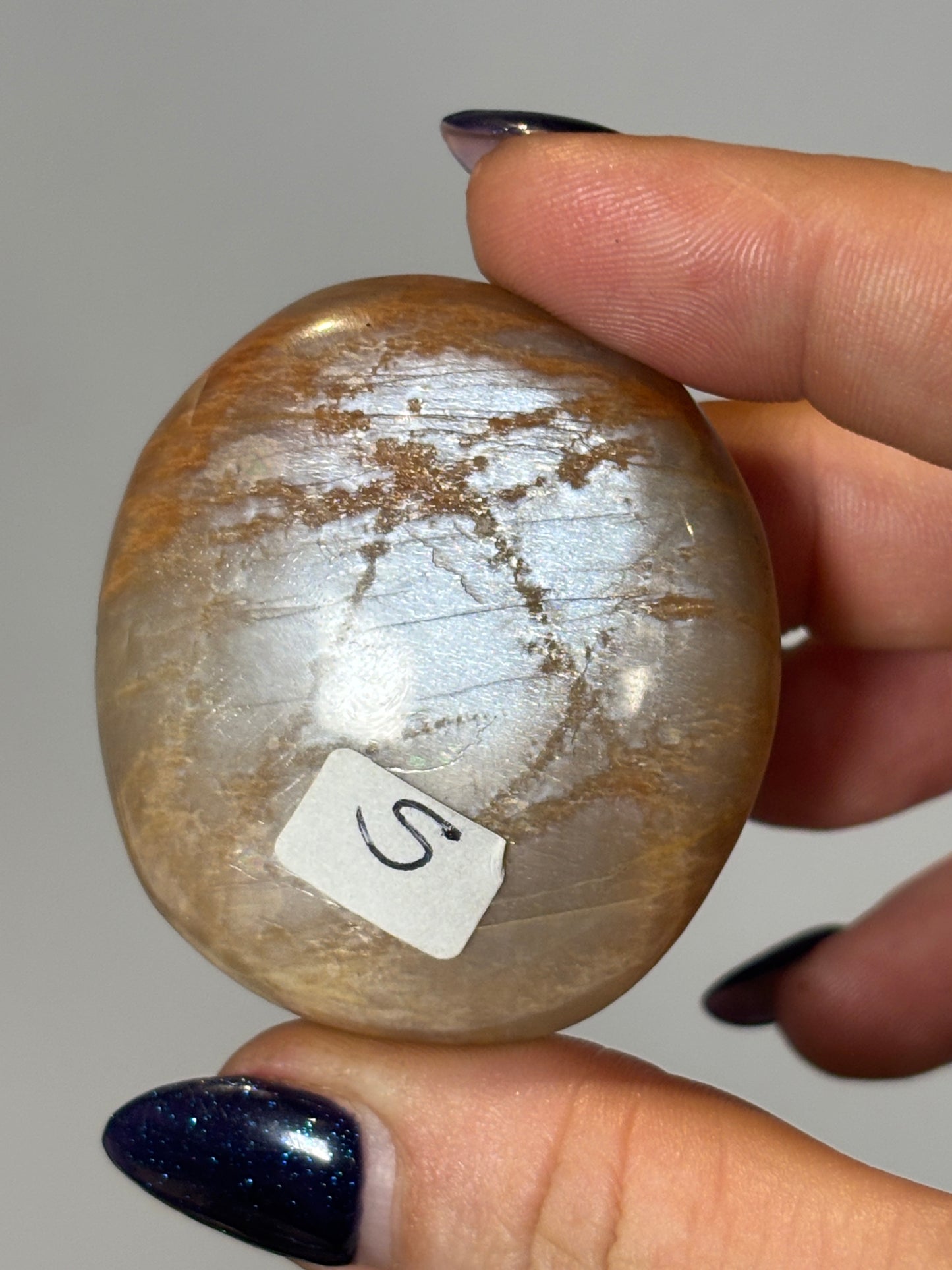 Peach moonstone palm stone