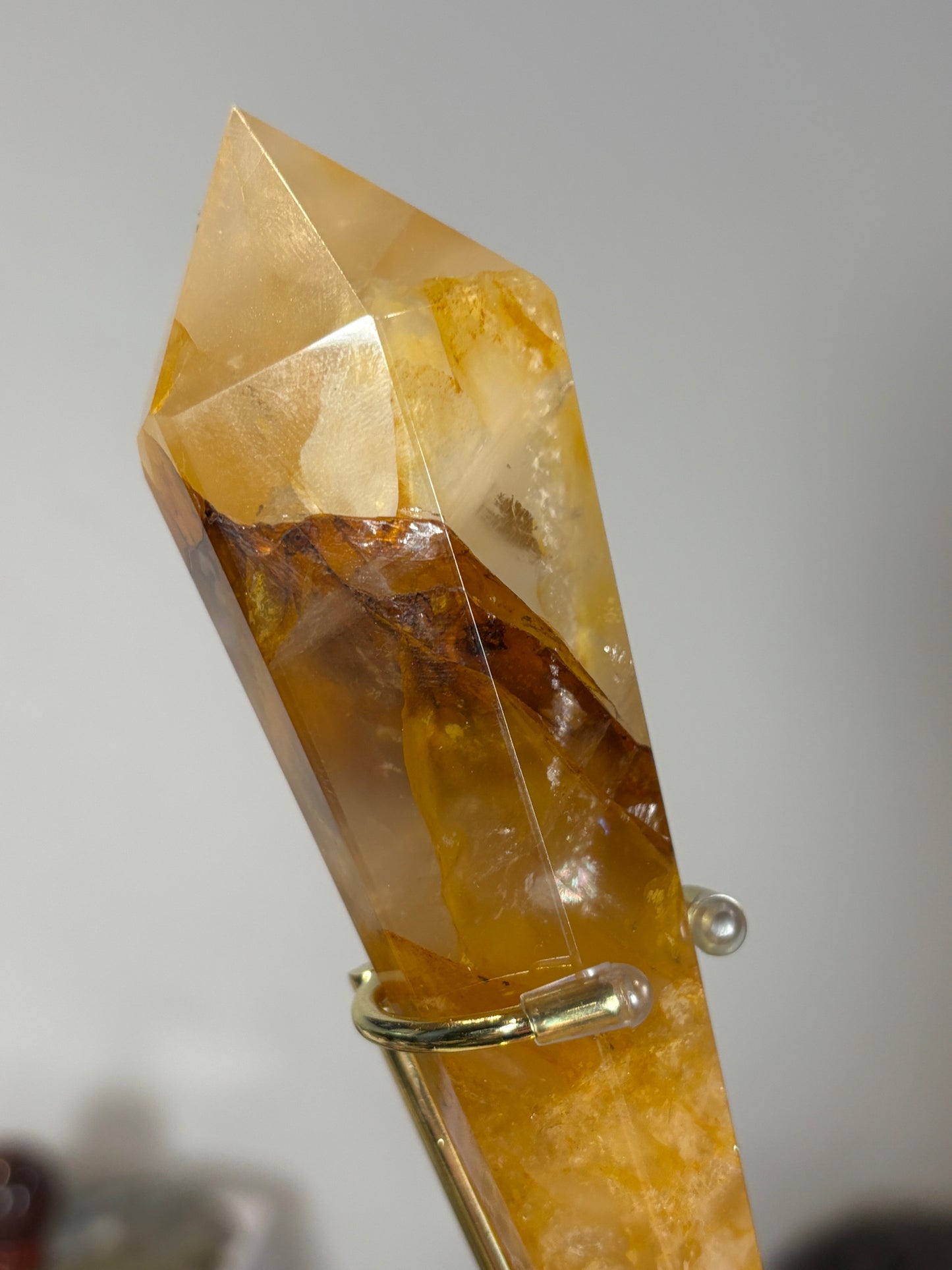 Golden healer wand on gold metal stand