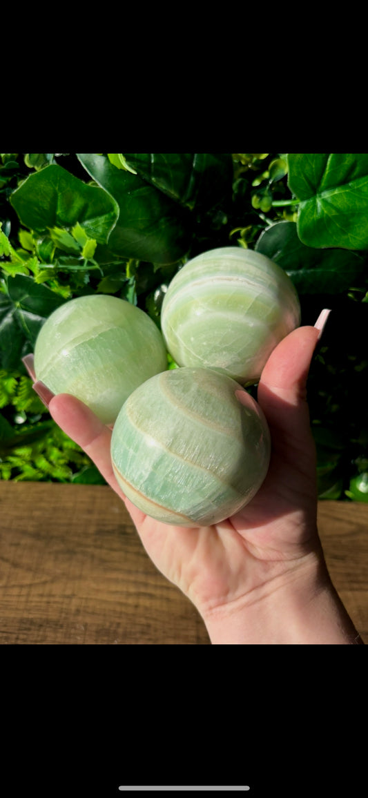 Pistachio-calcite-crystal-sphere.jpg