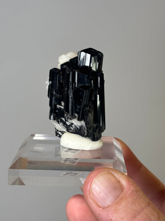 AAA quality black tourmaline with calcite