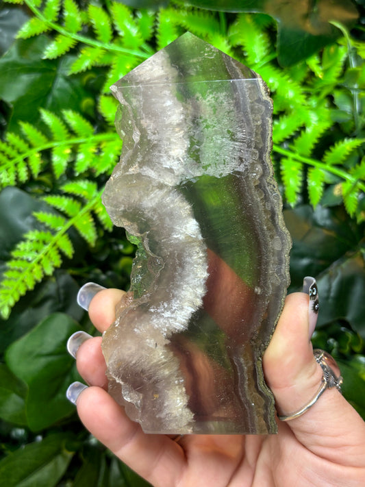 Part raw Fluorite tower with Pyrite