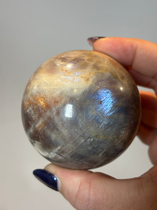 Sunstone in moonstone sphere