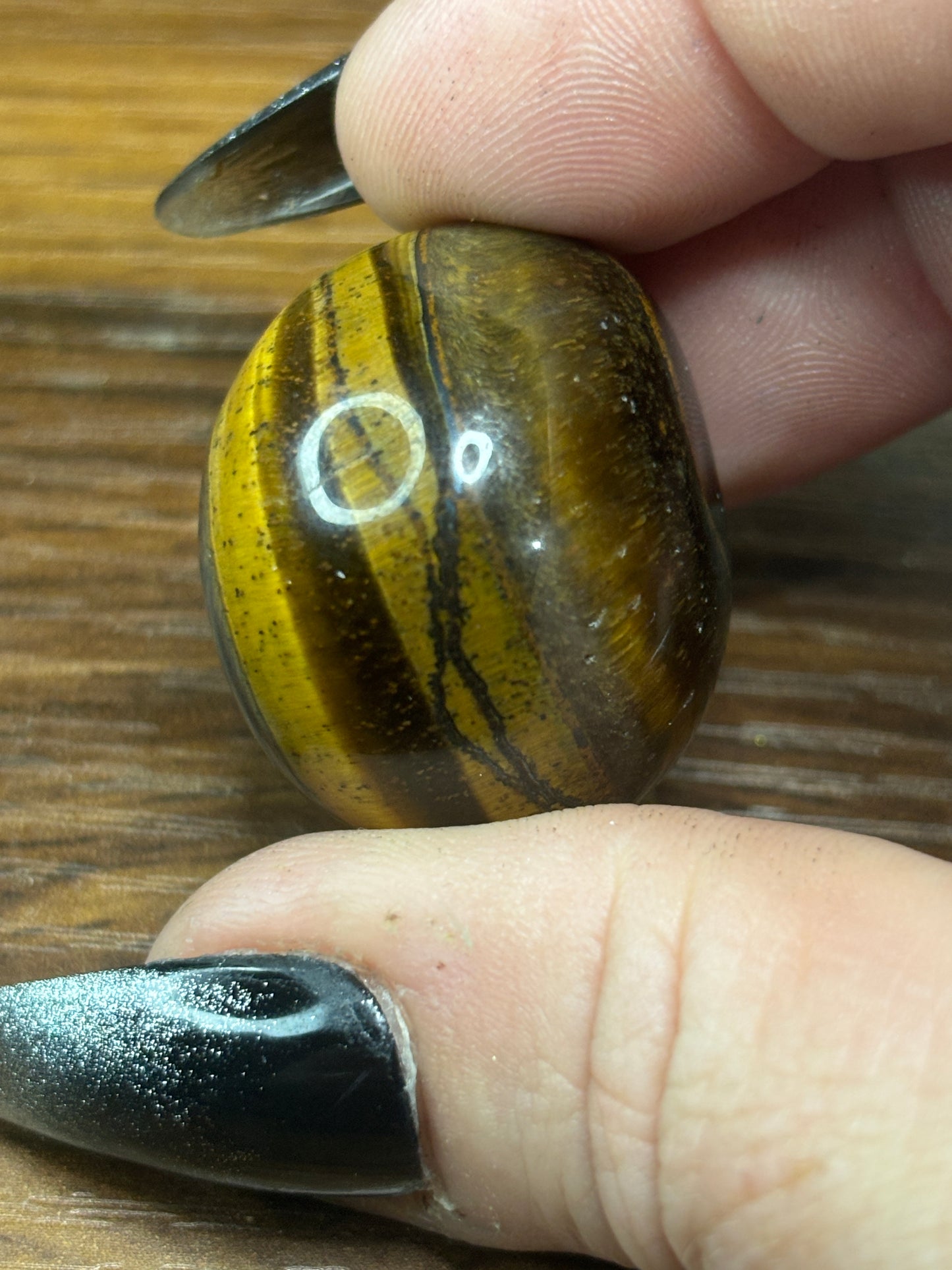 Yellow tigers eye tumble stone