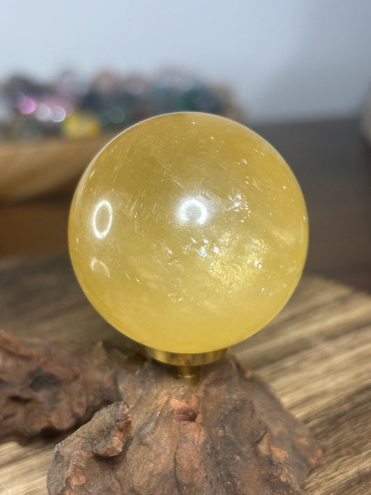 Honey calcite sphere